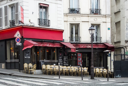 PARIS, FRANCE - FEBRUARY 1, 2017: A cafe with red decoration at Montmartre hill in Paris, France.のeditorial素材