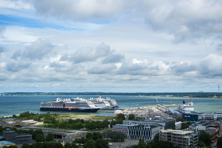 TALLINN, ESTONIA - JULY 22, 2015: Ferryboat terminal of Port of Tallinn and big cruise ships, a view from observation deck at the center of city, Tallinn, Estonia.のeditorial素材
