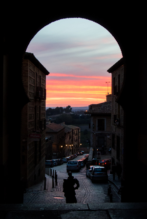 Early morning and sunrise, a view from an archway at square Plaza de Zocodover, Toledo, Castilla La Mancha, Spain.のeditorial素材