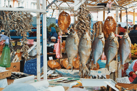 ODESSA, UKRAINE - OCTOBER 14, 2017: Plenty of dried fish of different types at the famous local market of Odessa, Privoz.のeditorial素材