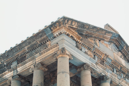GARNI, ARMENIA - DECEMBER 31, 2016: Close-up details of earthquake-damaged and reconstructed Garni Pagan greek roman hellenistic temple near Yerevan on cloudy winter day.のeditorial素材