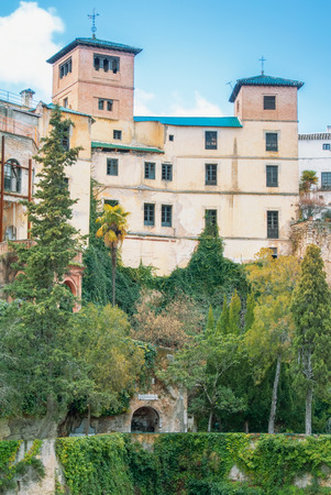 RONDA, SPAIN - FEBRUARY 04, 2014: View to Palacio del Rey Moro, 14th Century moorish palace, and hanging gardens in Ronda, a famous white village (pueblo blanco) in Malaga province, Andalusia, Spain.のeditorial素材