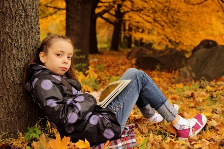 Girl on the nature of the tabletの写真素材