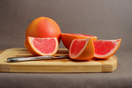 Grapefruit and slicesの写真素材