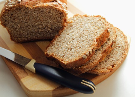 Cut into slices of bran bread, sprinkled with sunflower seeds