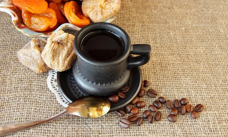 Cup with coffee  and dried fruit
の写真素材