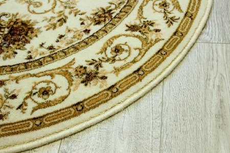 Wool oval rug on the floorの写真素材