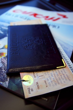 Passport with a ticket lying on the table in front of the seat in the fast train. Russia, St. Petersburg, January 29, 2015のeditorial素材