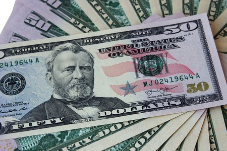 Dollar notes in denominations of $ 50, lying face