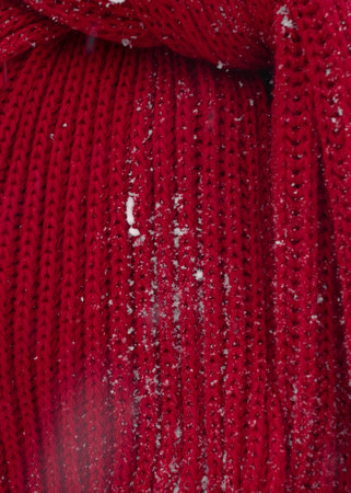Textured red knit scarf, cozy fabric details