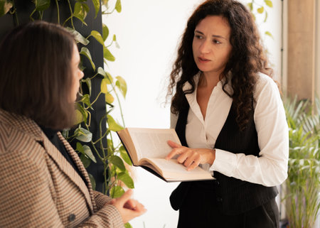 Female Friends Sharing Ideas in a Reading Community