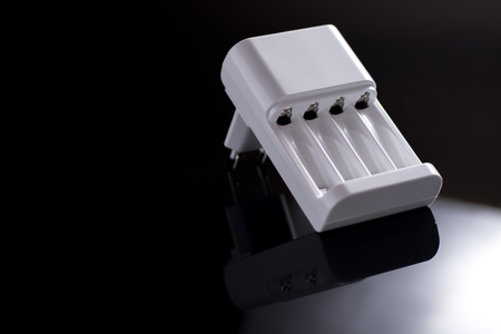 Battery Charger on Black Backgroundの写真素材