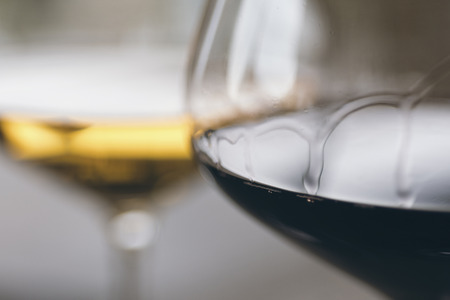 Glasses of Red and White Wine Close Upの写真素材