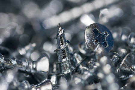 Silver Screws Macro Close Up. Background Pattern.の写真素材