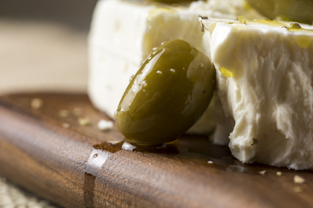 Greek Feta Cheese with Green Olives, Oregano and Olive Oilの写真素材