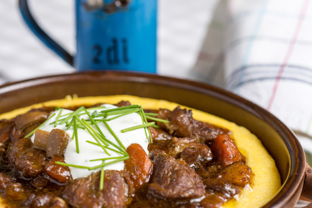 Beef Stew with Mushrooms, Carrots and Corn Polentaの写真素材