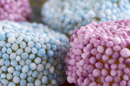 Gummy Candy Sprinkle Coated on Dark Stone Backgroundの写真素材