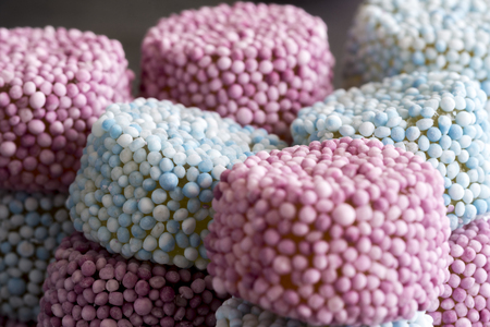 Gummy Candy Sprinkle Coated on Dark Stone Background