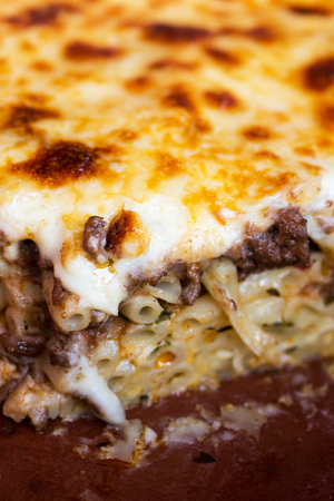 Pastitsio Traditional Greek Baked Pasta Casserole With Ground Beef, Tomatoes, Feta Cheese and Bechamel Sauceの写真素材