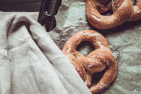 Fresh Rustic Pretzels From the Oven on Baking Sheetの写真素材