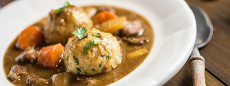 Scandinavian Venison Hunters Stew with Bacon and Onion Dumplingsの写真素材