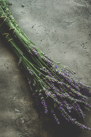 Lavender Flowers Bouquet on Rustic Dark Background. Treats Sleep Issues.の写真素材