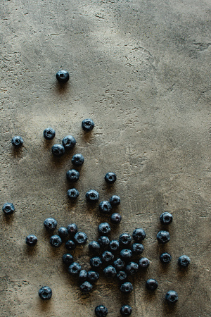 Organic Blueberries on Rustic Dark Background. Antioxidant Superfood Concept for Healthy Eating and Nutrition.の写真素材