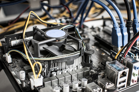 Cryptocurrency Mining Rig Connectors on Motherboard for Graphic Cards