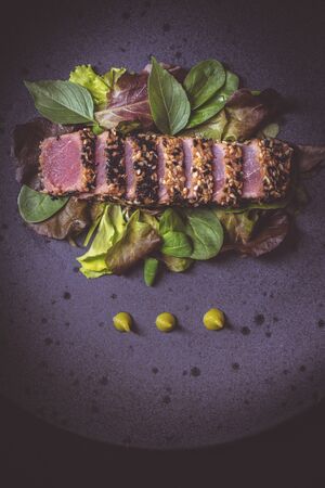 Grilled Tuna Steak with Salad and Hot Wasabi Sauce