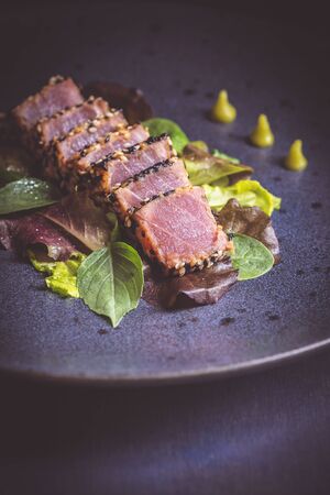 Grilled Tuna Steak with Salad and Hot Wasabi Sauce