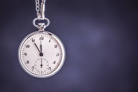 Old Vintage Pocket Watch on Dark Background. Business Deadline. Time Management Concept.の写真素材