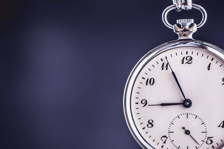 Old Vintage Pocket Watch on Dark Background. Business Deadline. Time Management Concept.の写真素材