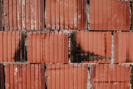 Red Brick Cement Wall Background and Texture. Industry Design Concept.の写真素材