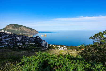 View of the Ayu-Dag mountain and the city of Gurzuf from the observation deck. Crimean Mountains. May. 2021. Crimea. Russia. The Crimean Peninsula.の写真素材
