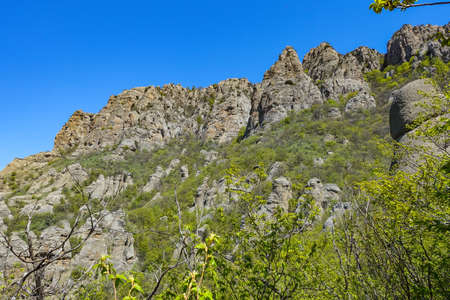 The Valley of Ghosts. Demerji. Green trees and bushes in the foreground. May 2021. Crimea.の写真素材