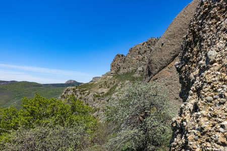 The Valley of Ghosts. Demerji. Green trees and bushes in the foreground. May 2021. Crimea.の写真素材