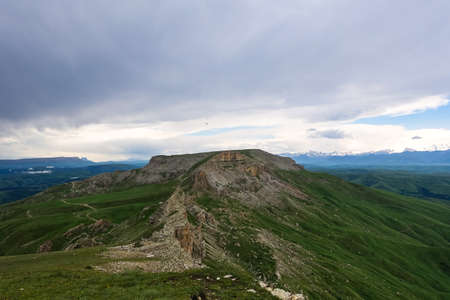 View of Elbrus and the Bermamyt plateau in the Karachay-Cherkess Republic, Russia.の写真素材