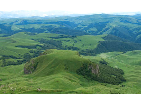 View of Elbrus and the Bermamyt plateau in the Karachay-Cherkess Republic, Russia.の写真素材