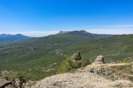 View of the Chatyr-Dag plateau from the top of the Demerdzhi mountain range in Crimea.の写真素材