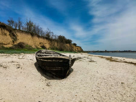 Fishing boat on the beach of Taganrog Bay. Rostov region.の写真素材