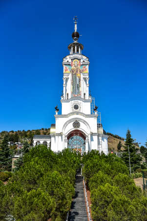 Orthodox Church of St. Nicholas the Wonderworker against the blue sky on the southern coast of Crimeaのeditorial素材