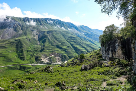View of the mountains in the clouds and the entrance to the stone bowl. Dagestan.