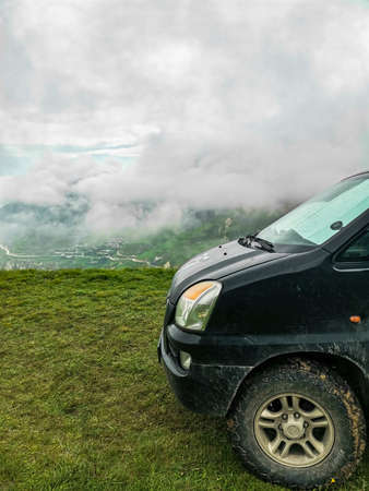 A car in a morning cloud in the mountains of Dagestan. Russia.のeditorial素材