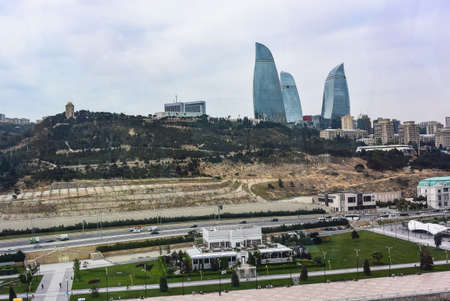 View of the flame towers from the Ferris wheel on the embankment in Baku. Azerbaijan 2019のeditorial素材