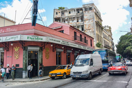 havana. Cuba - March 27, 2019 : street scene with old cars and colorful buildings in Old Havanaのeditorial素材