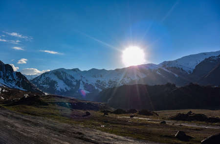 Sun rays on the Georgian military road, beautiful mountain scenery and mountain rivers along it. Georgiaの写真素材