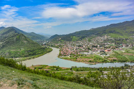Mtkvari river meets the Aragvi river with Svetitskhoveli Cathedral on the right, as seen from the...