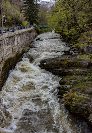 View from the bridge on the river of the resort town of Borjomi in Central Georgia. April 30, 2019