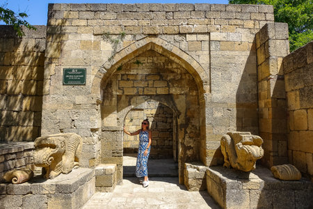 A girl on the territory of the Naryn-Kala Fortress in Derbent. Dagestan, RussiaJune 2021のeditorial素材