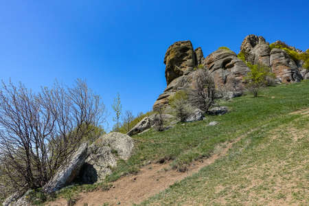 Ancient limestone high mountains of rounded shape in the air haze. The Valley of Ghosts. Demerji. Crimea.の写真素材